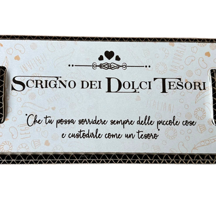 Packaging LEGÙ "Scrigno dei Dolci Tesori" con la frase "Che tu possa sorridere sempre delle piccole cose e custodirle come un tesoro".