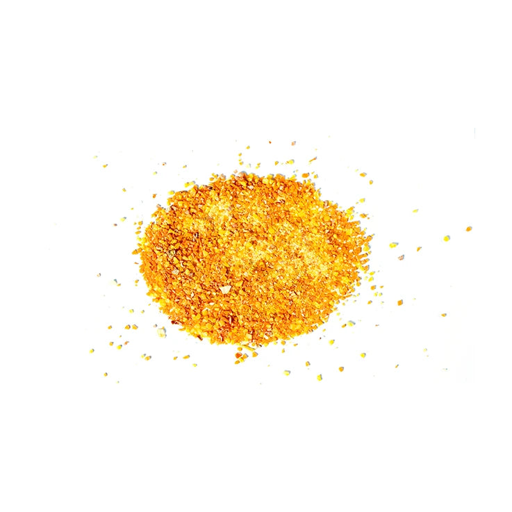 LEGÙ Ragù Veg: primo piano di granulato giallo-arancio. Ragù vegetale, a base di legumi e senza glutine per proteine vegetali.